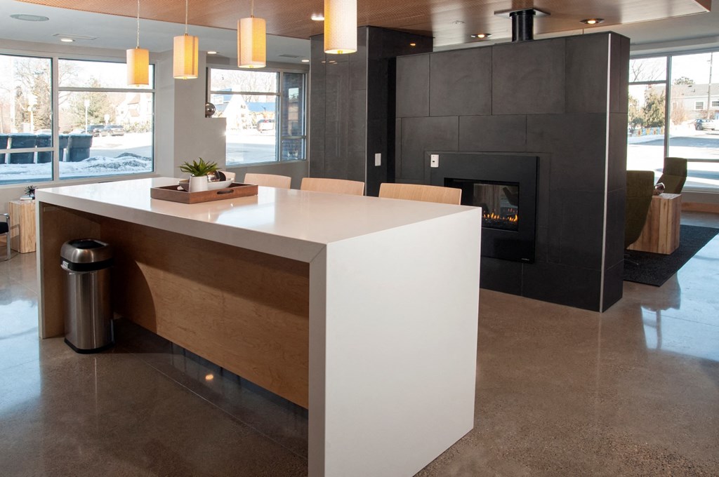 Zest Apartments lobby with fireplace