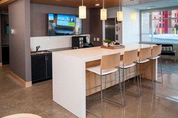 Zest Community kitchen with island, seating and tv - Photo Gallery 14