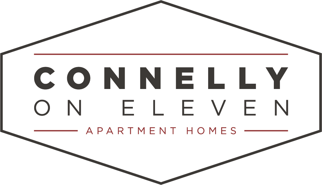 A black and white image of a logo for Connelly on Eleven Apartment Homes.