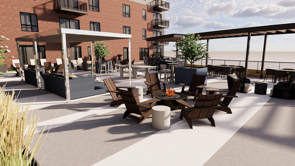 A modern outdoor seating area with wooden chairs and tables.