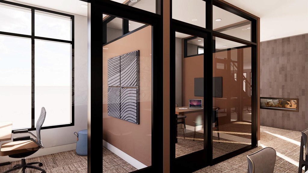 A room with a brown wall and a black chair.