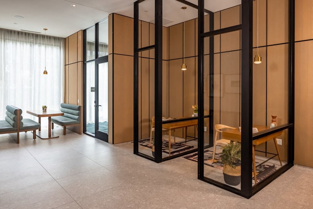 a room filled with furniture and a large window