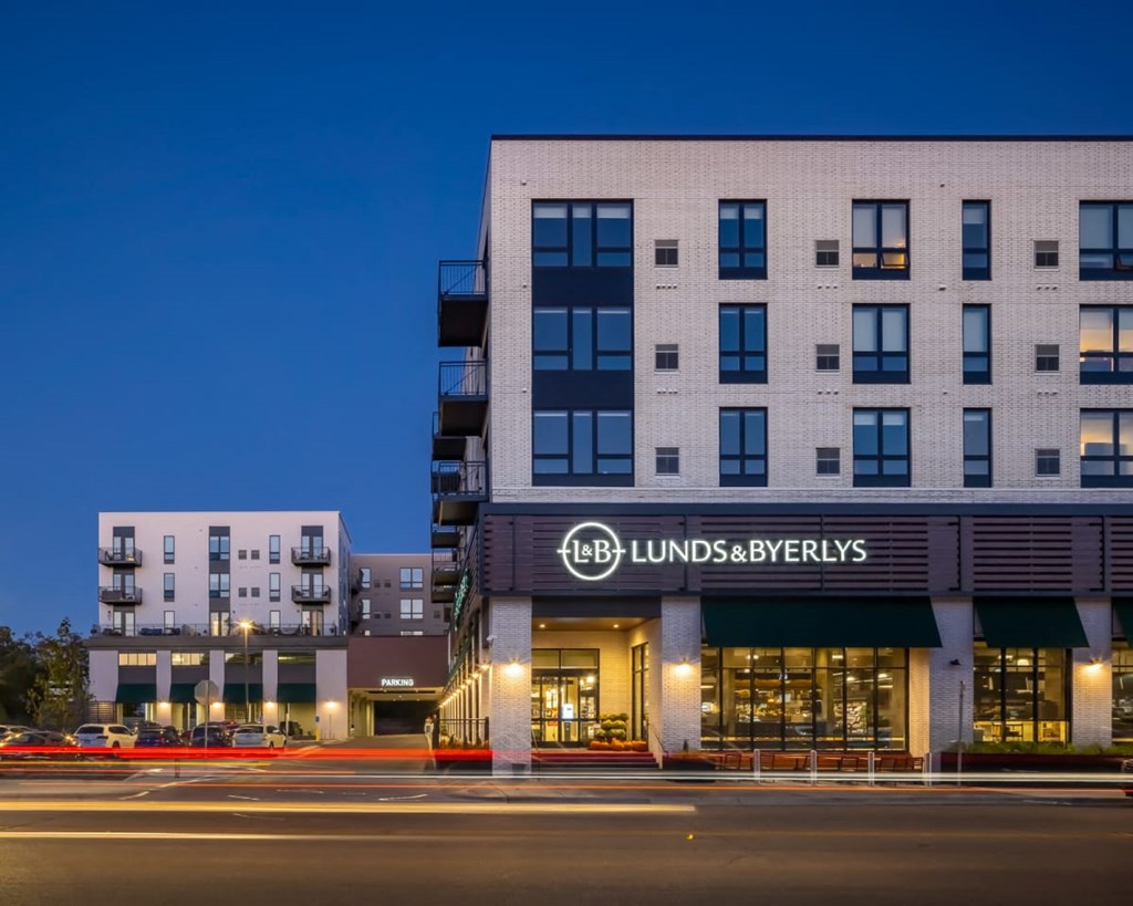 a large white building with a sign that reads lubbock brewers on the front of it