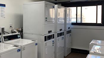 a row of white appliances in a room