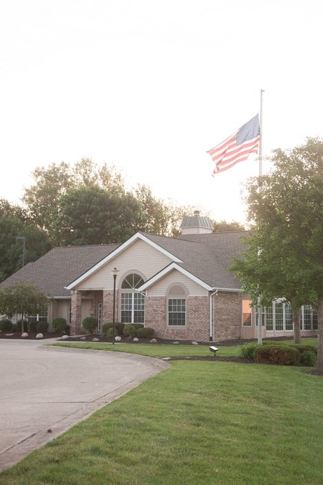 a house with an flag on the roof
