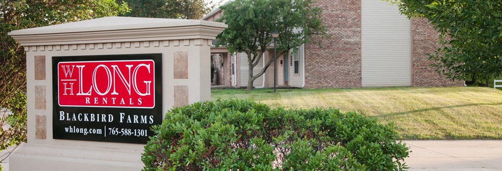the long rentals sign in front of a house