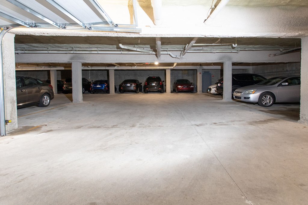 a parking garage with cars parked in it