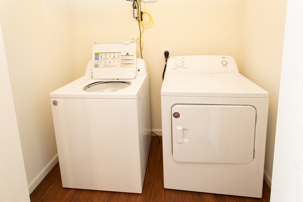 a washer and dryer in a room with a washing machine