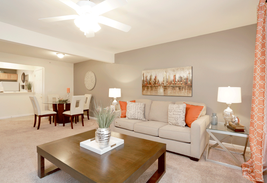 a living room with a couch and coffee table