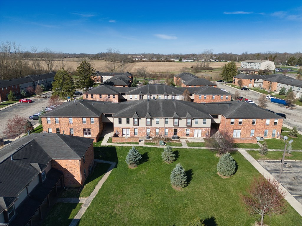 an aerial view of a group of houses in a neighborhood