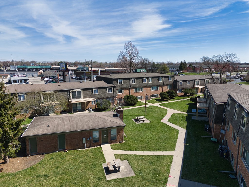 an aerial view of a group of houses in a neighborhood