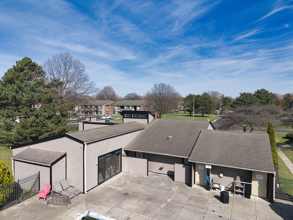 the view of a building from the roof of another building