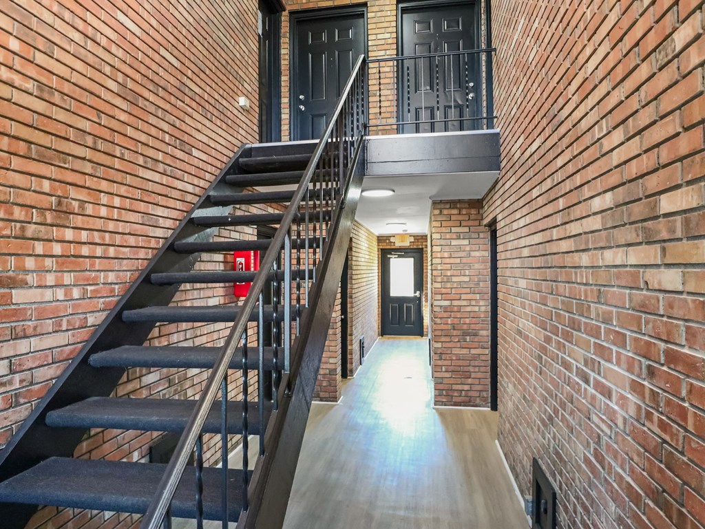 the stairway leading up to the second floor of the building