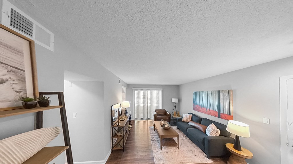 a living room with a couch and a table