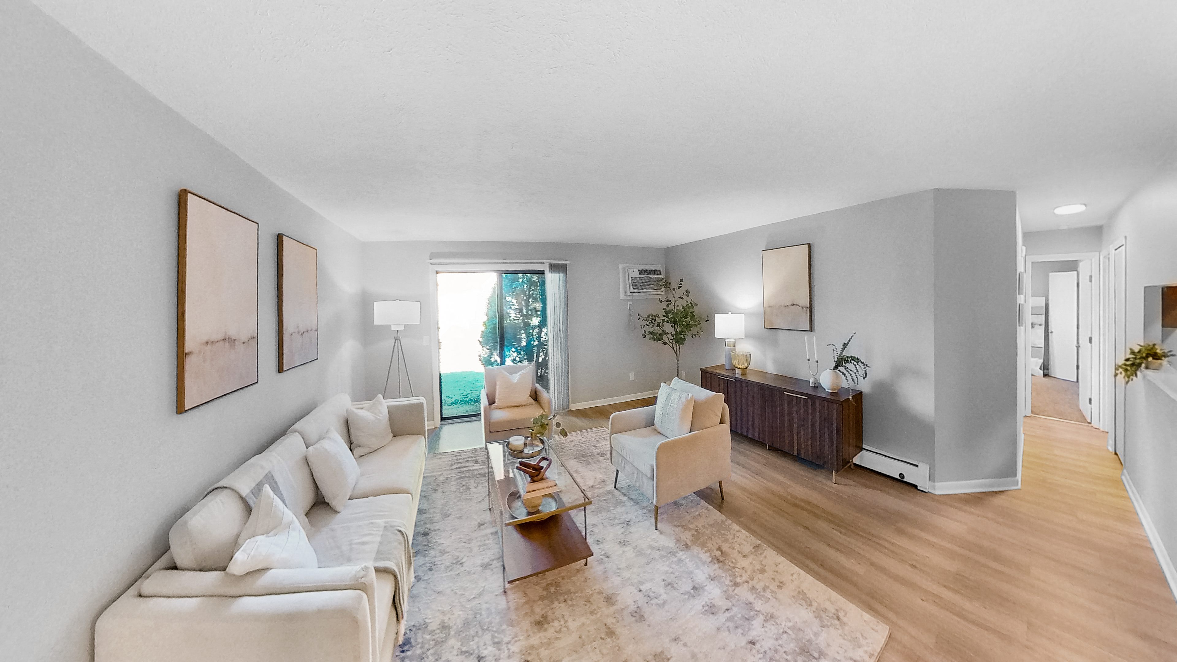a living room with a couch and a table