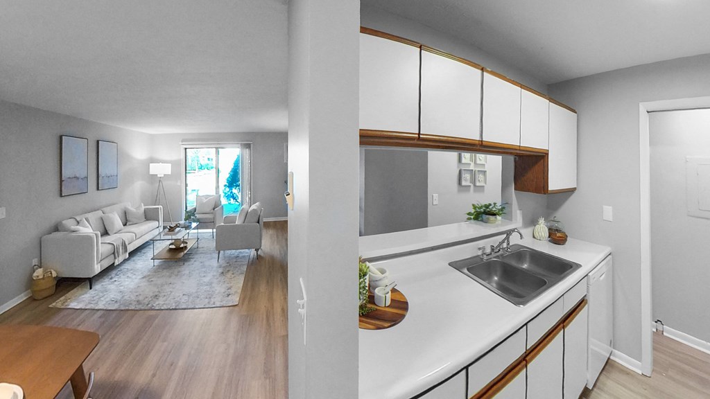 a kitchen and living room in an apartment at The Element @ St Andrews, Mishawaka, IN