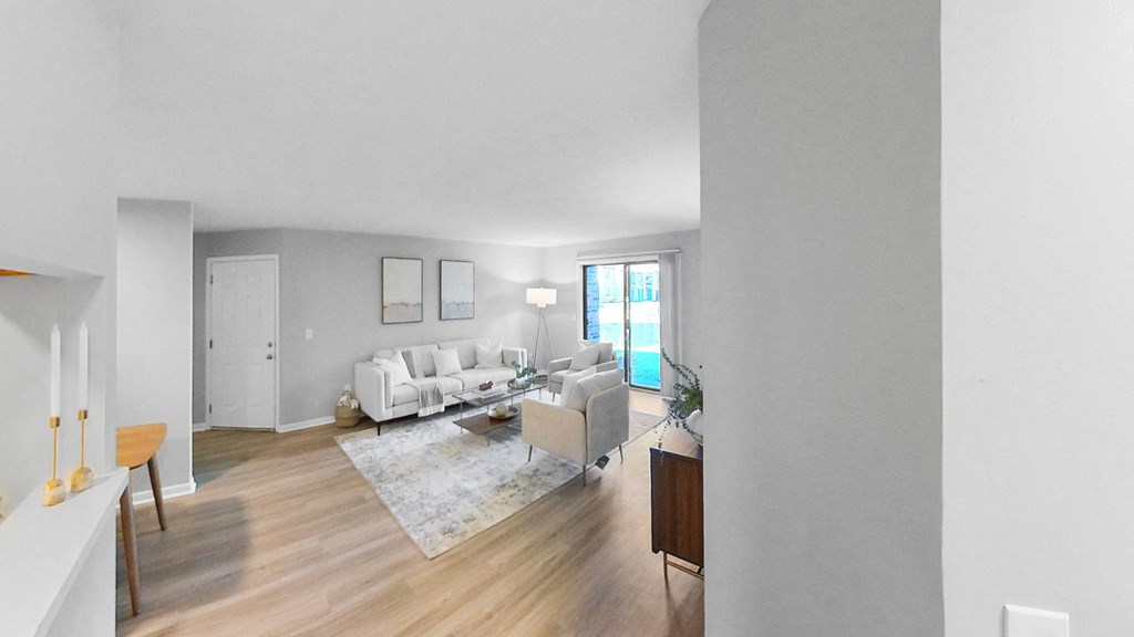 a living room with a couch and a table at The Element @ St Andrews, Mishawaka, IN, 46545