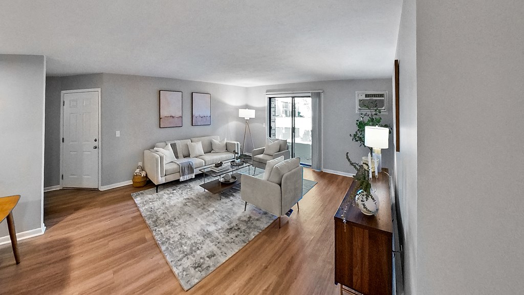 a living room with a couch and a table at The Element @ St Andrews, Indiana, 46545