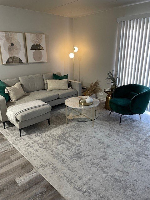 a living room with a couch and a chair