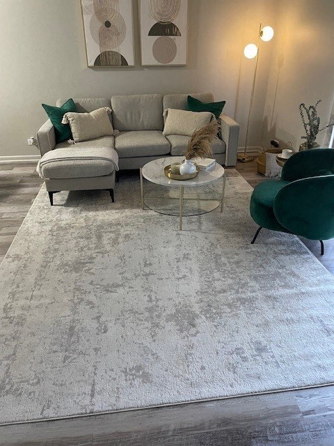 a living room with a couch and a table