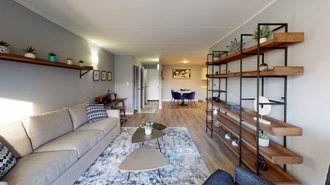 a living room with a couch and a table