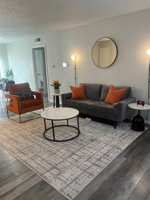 a living room with a couch and a table