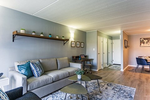 a living room with a couch and a table