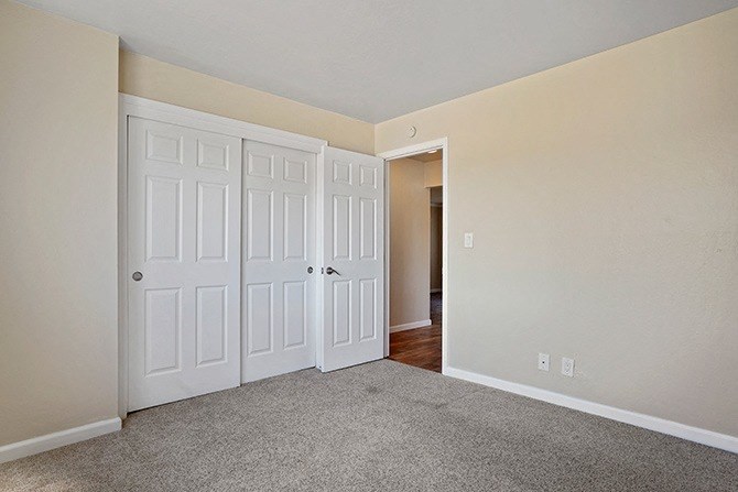 Bedroom With Closet at Colonial Garden Apartments, California