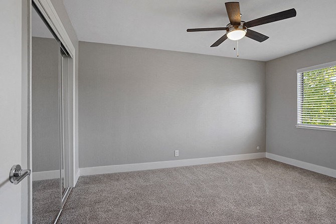 Carpeted Bedroom Space at Colonial Garden Apartments, San Mateo