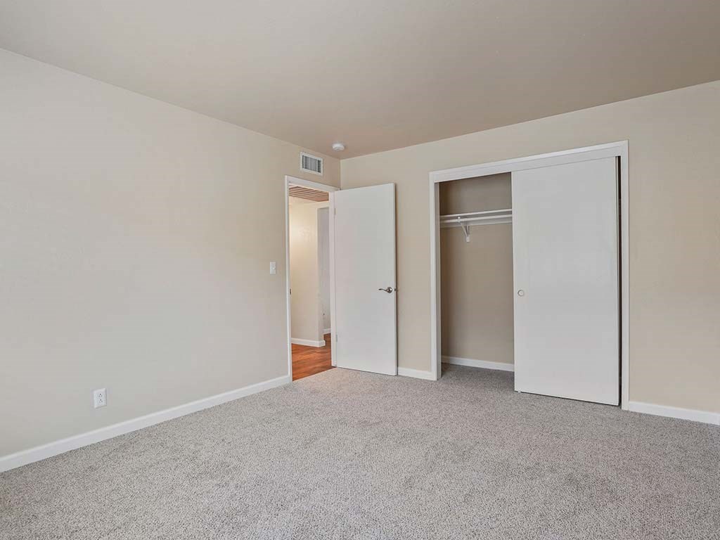 Carpeted Bedroom Area at Parkside Apartments, Davis
