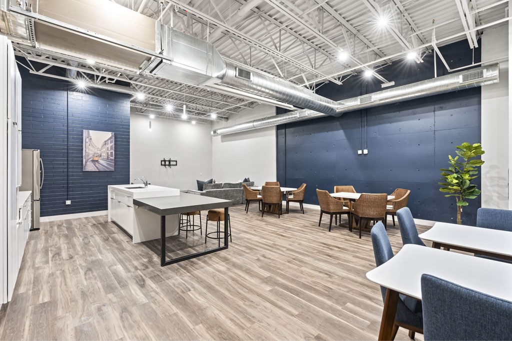 A modern office space with a white desk and chairs. at Brickside Heights, Millcreek, 84106