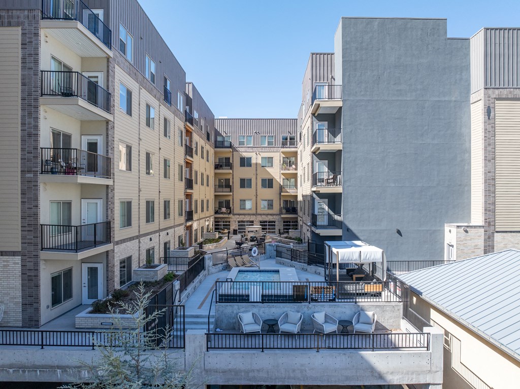 a view of an apartment complex with a pool in the middle at The Revival, Salt Lake City, UT