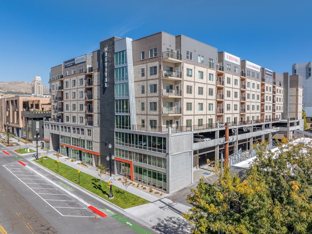 a large building with many windows and a street in front of it at The Revival, Salt Lake City, UT, 84101