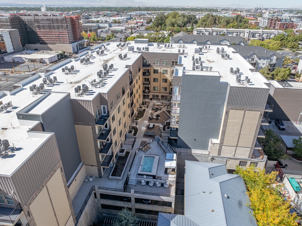 arial view of a building in a city with other buildings at The Revival, Utah, 84101