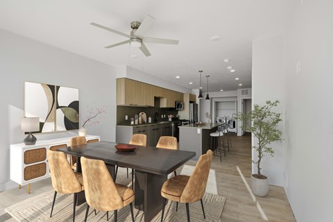 Open dining area with modern kitchen at Brickside Heights Apartments, Millcreek, 84106