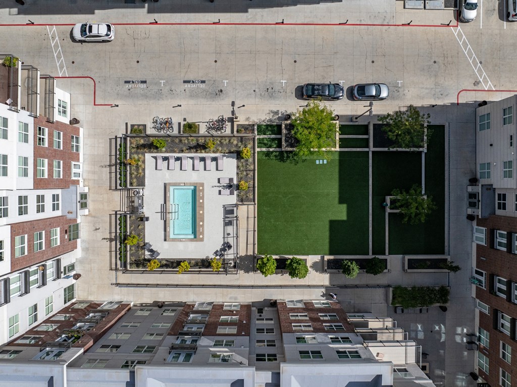 an aerial view of a building with green turf and a blue door on the roof at 200 City View, Provo, 84601
