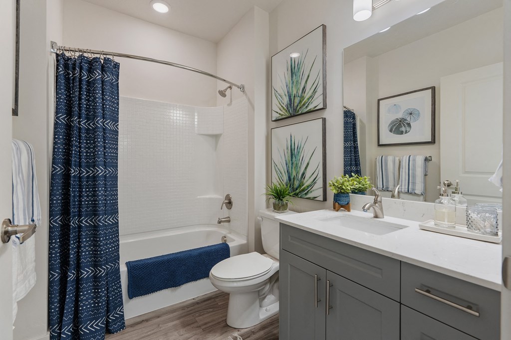 a bathroom with a shower and a sink and a toilet at 200 City View, Provo