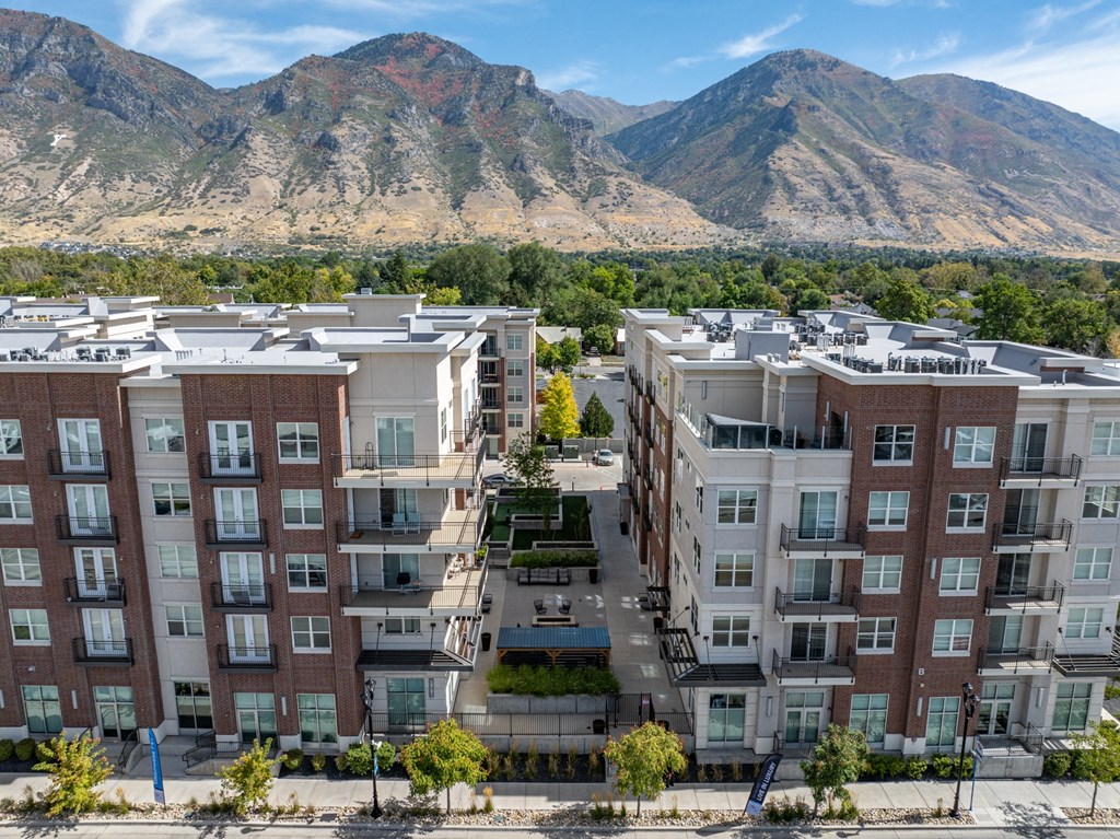 an aerial view of an apartment building with mountains in the background an aerial view of an apartment building with mountains in the background at 200 City View, Provo, UT, 84601