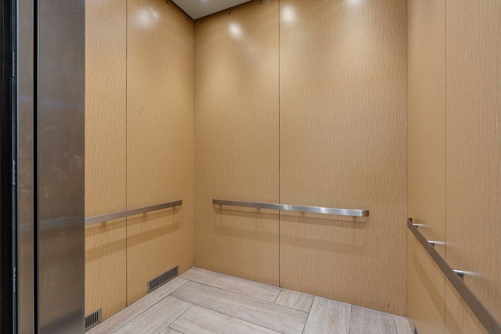 a large closet in a bathroom with mirrored doors at 200 City View, Provo, Utah