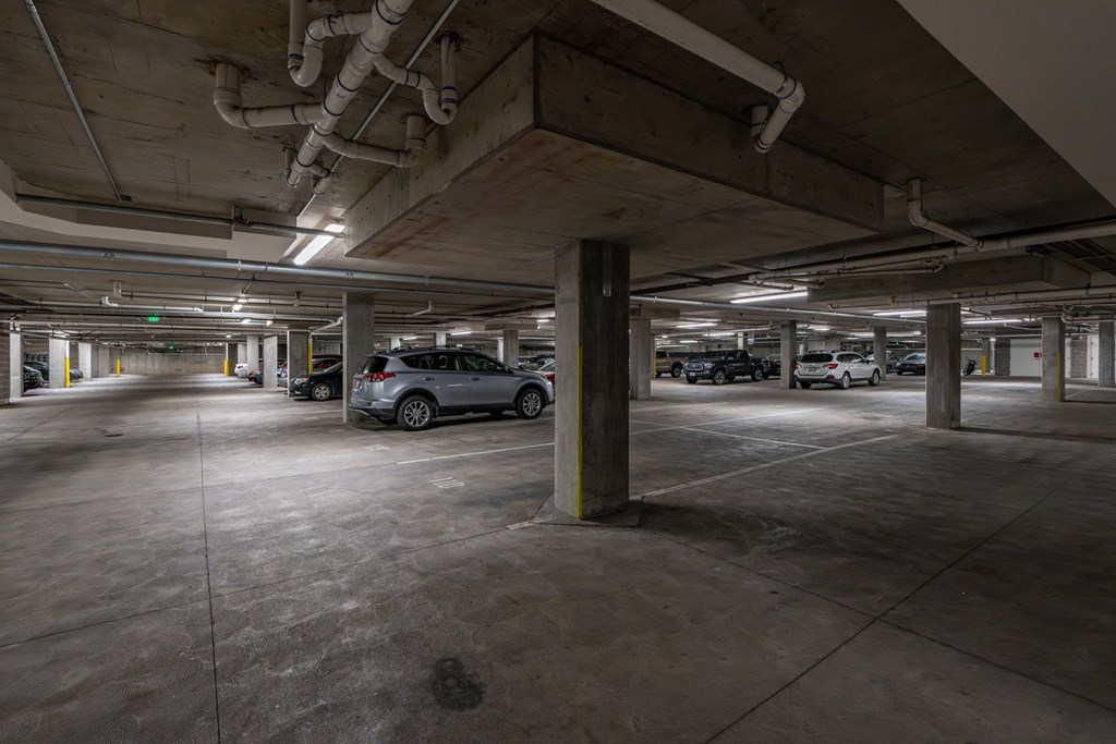 an empty parking garage with cars parked in it at 200 City View, Provo