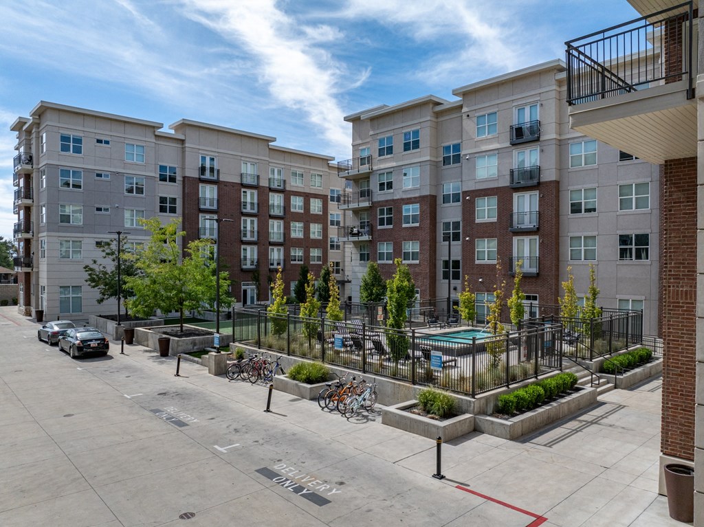an empty parking lot in front of an apartment building at 200 City View, Provo, UT