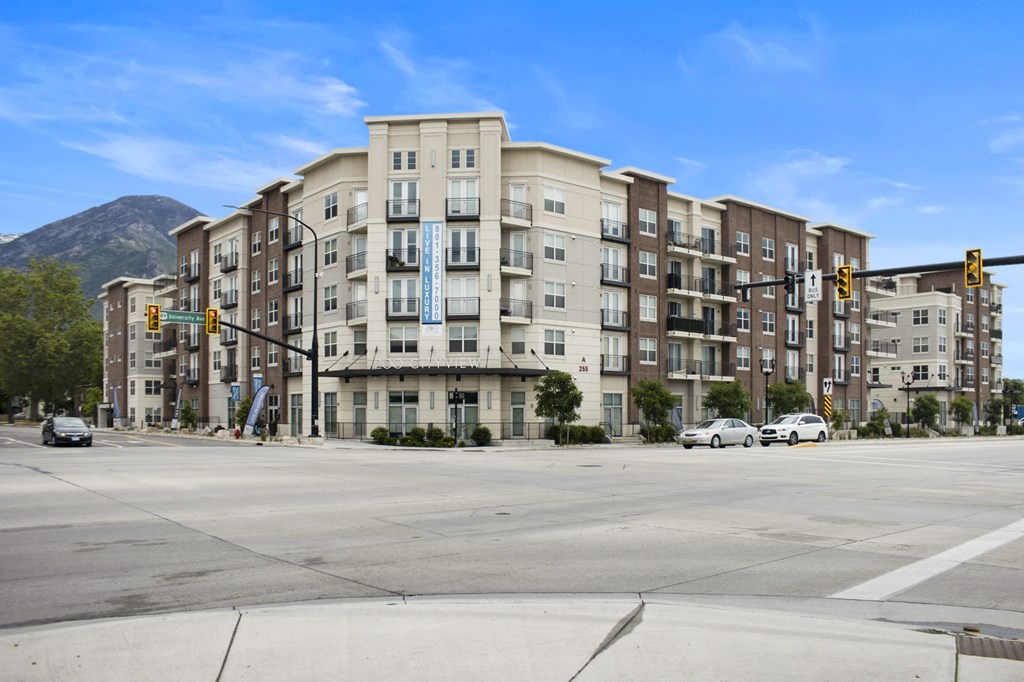 a large apartment building on the corner of a street at 200 City View, Provo