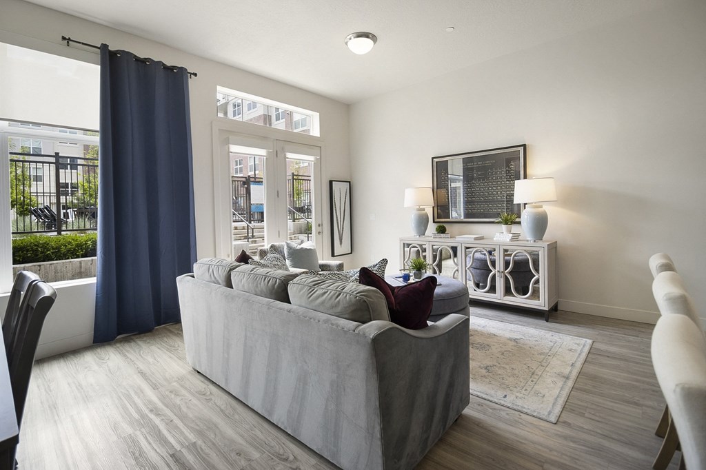 a living room with a couch and chairs at 200 City View, Provo, 84601