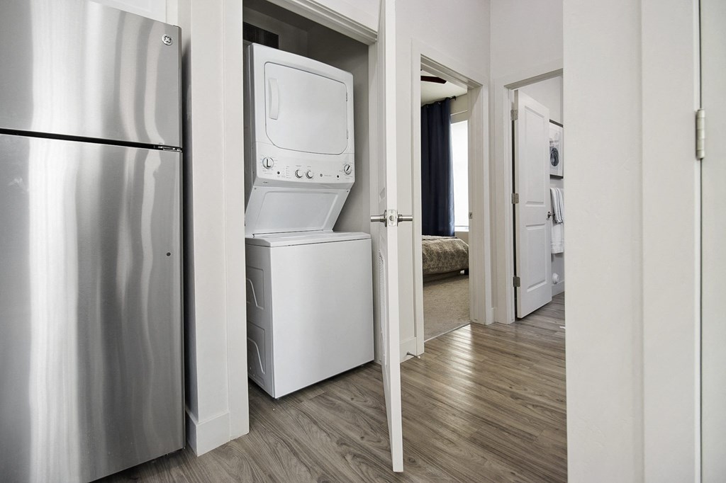 a room with a washer and dryer in it at 200 City View, Utah