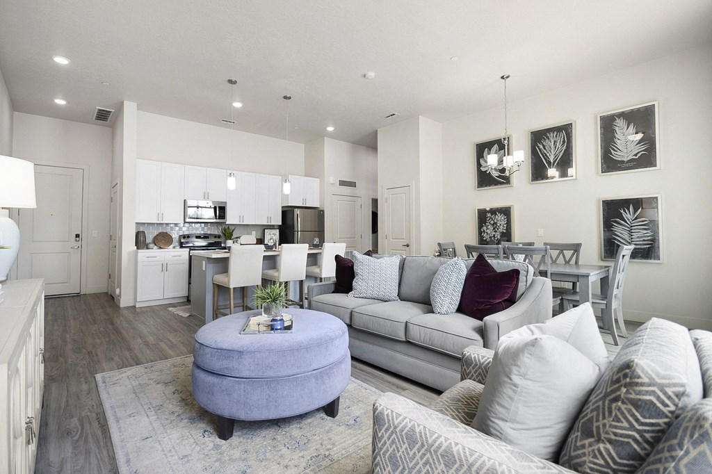 a living room with a couch and a chair at 200 City View, Provo
