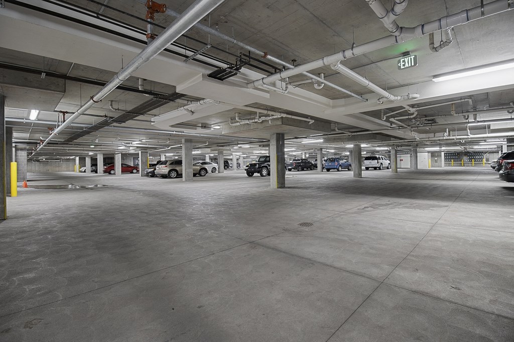 a parking garage with cars in it at 200 City View, Utah, 84601