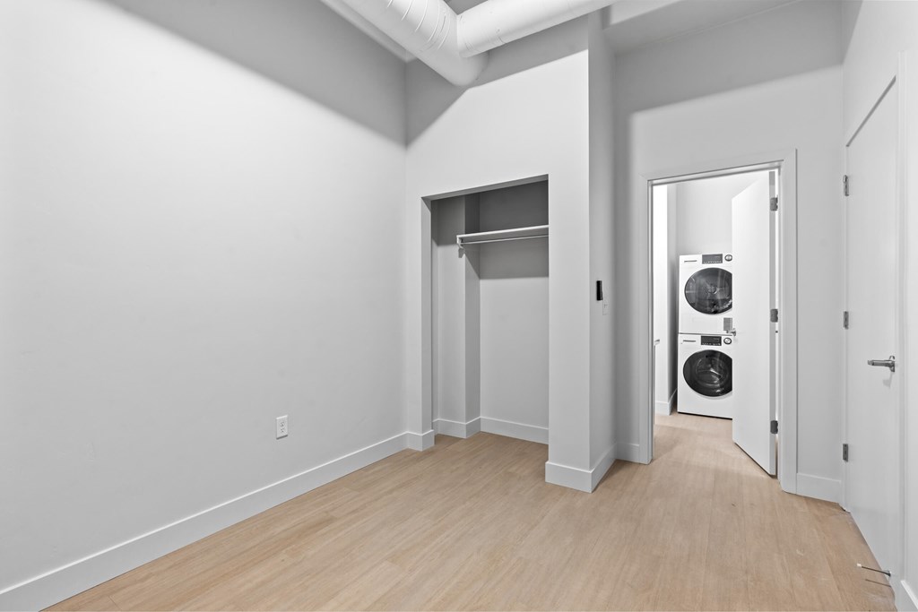 A laundry room with a washer and dryer. at Brickside Heights, Utah, 84106