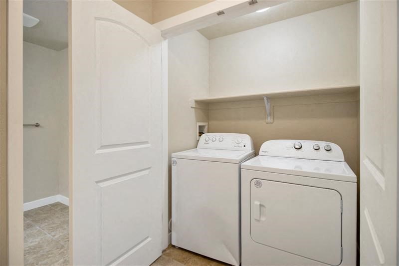 a white washer and dryer in a room at Siena Villas Apartments, Utah