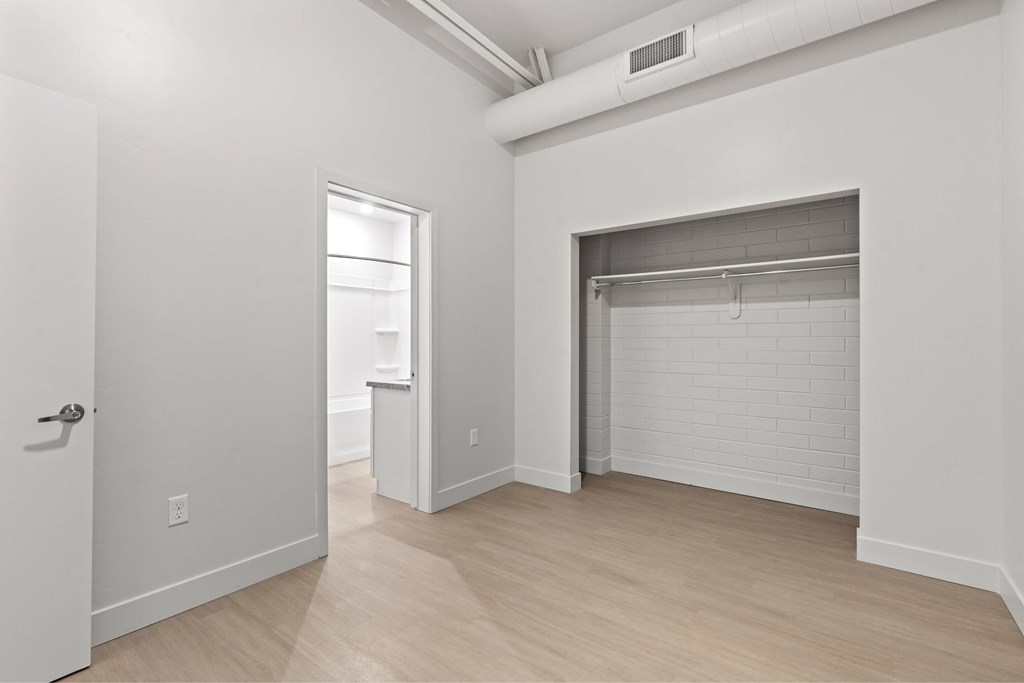 A white room with a door and a window. at Brickside Heights, Millcreek, 84106