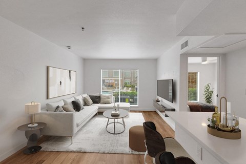 a living room with a couch and a table and a television
